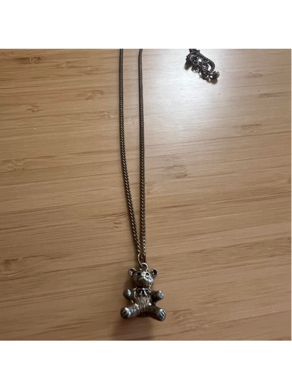 Vintage-looking gold teddy bear charm necklace